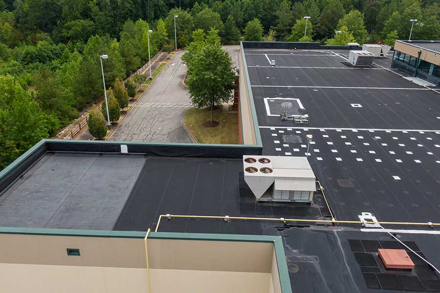 Commercial HVAC installation on rooftop building in Naples FL