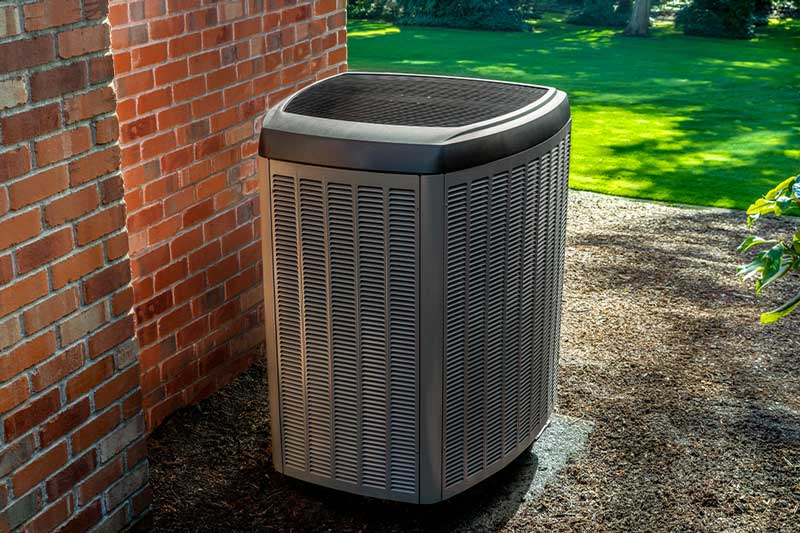 New heat pump installed outside a home in Naples FL