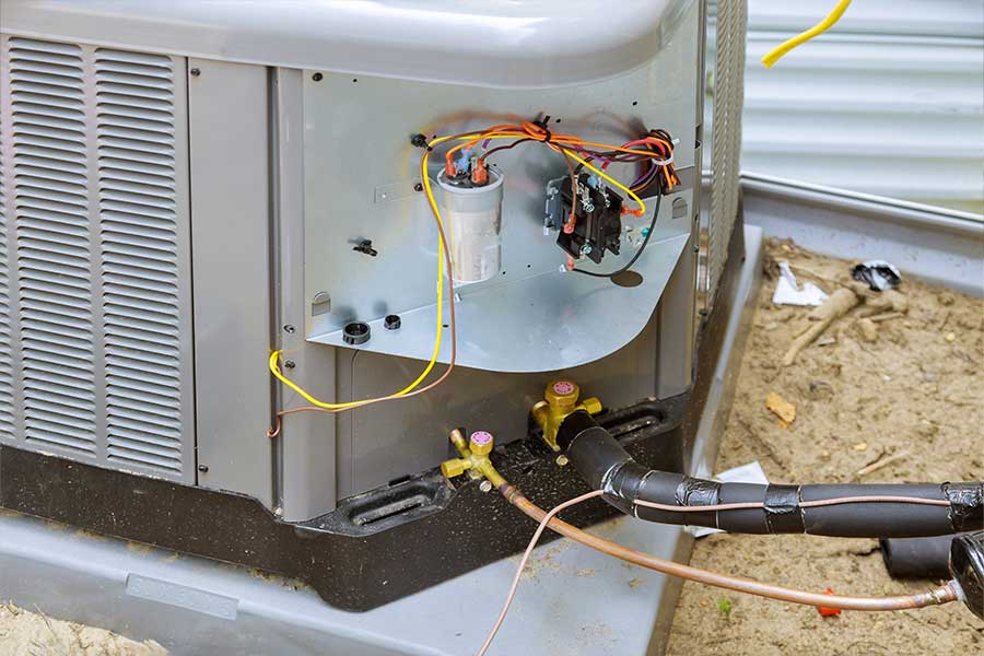 AC electrical components inspected during capacitor replacement in Naples, FL