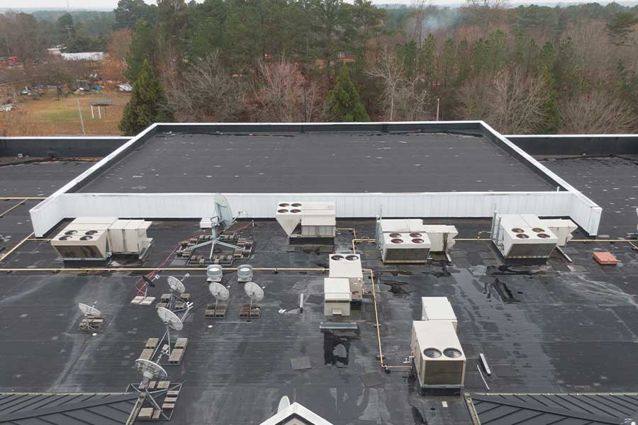 Rooftop commercial HVAC units serving a Naples, FL building