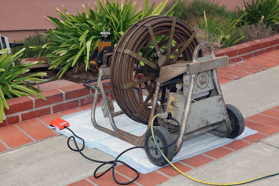 Drain auger machine used for routine plumbing maintenance in Naples, FL