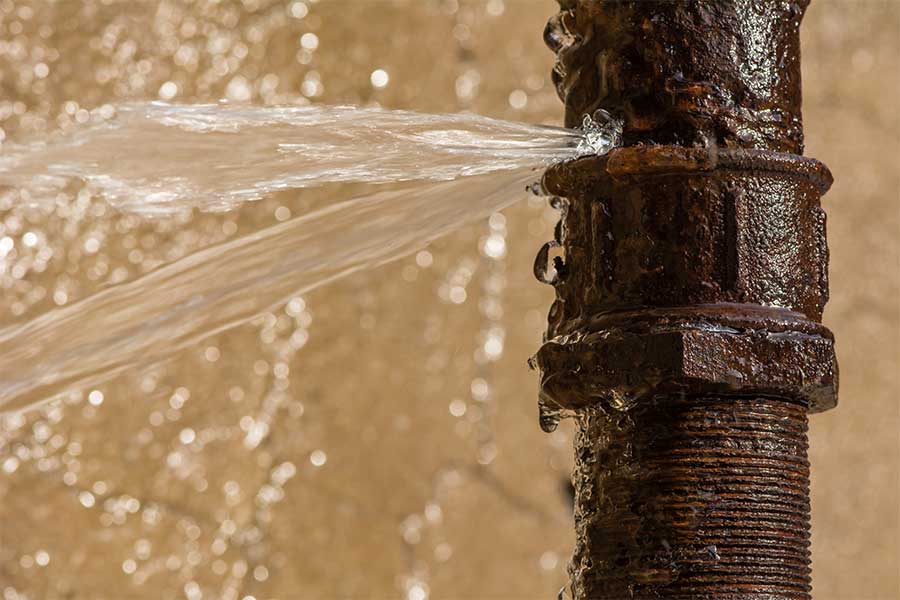 Leaking pipe requiring professional plumbing repair in Naples, FL